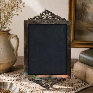 Gilded bow silver plated picture frame